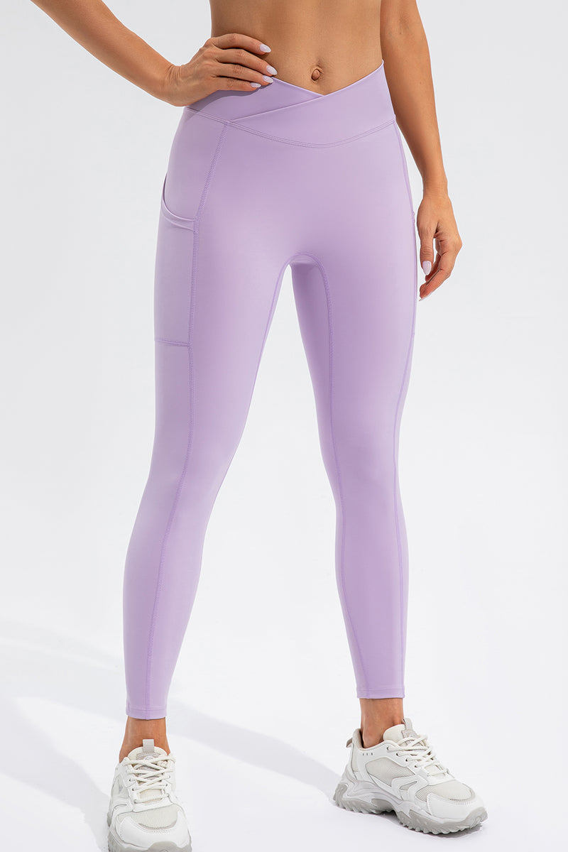 Leggings activos de cintura alta con bolsillos