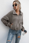Chaqueta teddy con cremallera y dobladillo con cordón