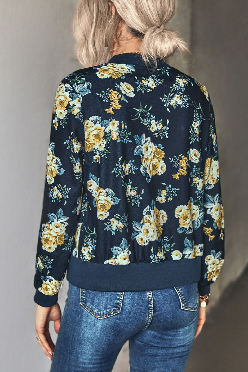 Chaqueta bomber floral con cremallera y ribete acanalado