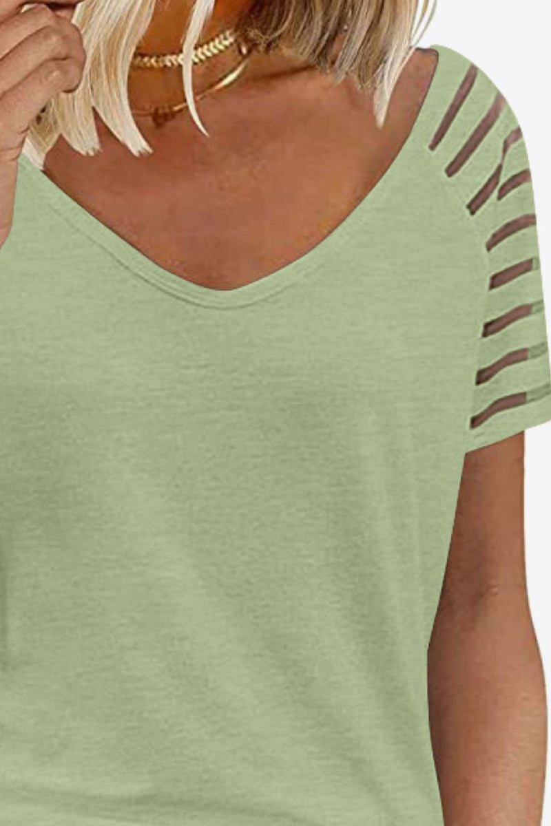 Camiseta con cuello en V y manga raglán