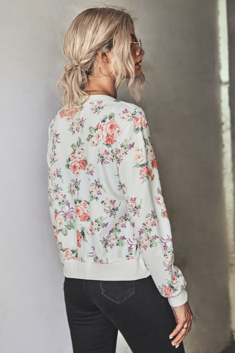 Chaqueta bomber floral con cremallera y ribete acanalado